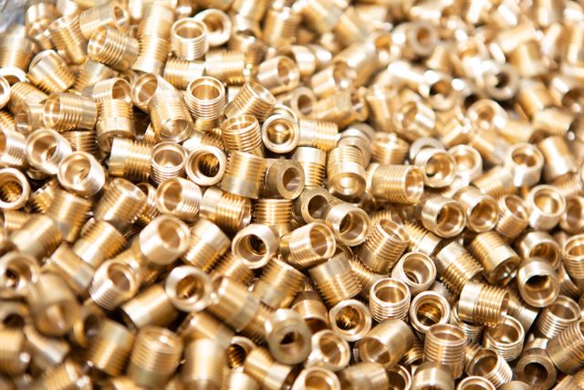 Pile of brass fittings and nuts